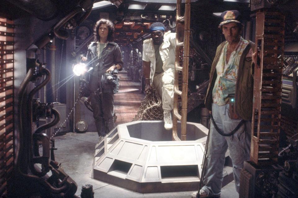 American actors Sigourney Weaver, Yaphet Kotto and Harry Dean Stanton on the set of Alien, directed by Ridley Scott.