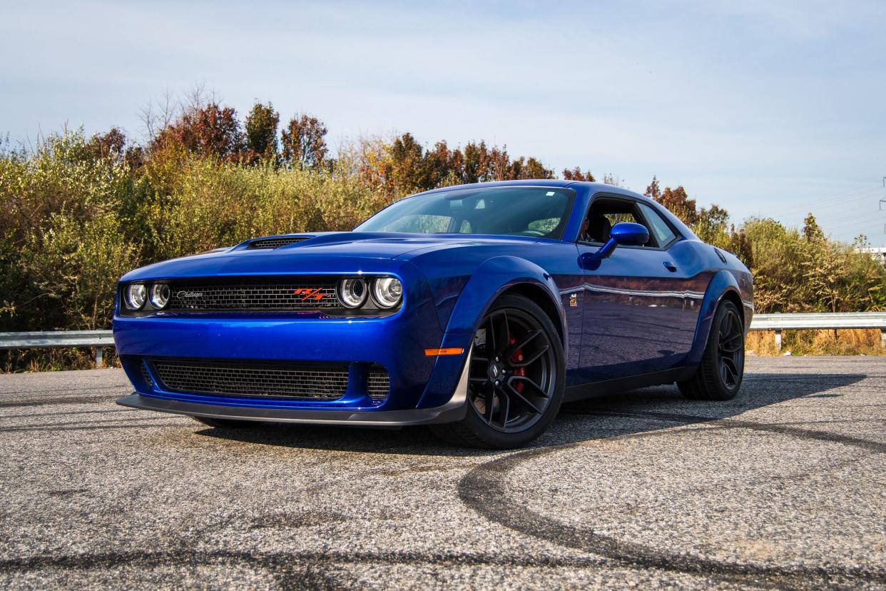 Parked blue Dodge Challenger R/T Scat Pack Plus Widebody 2019