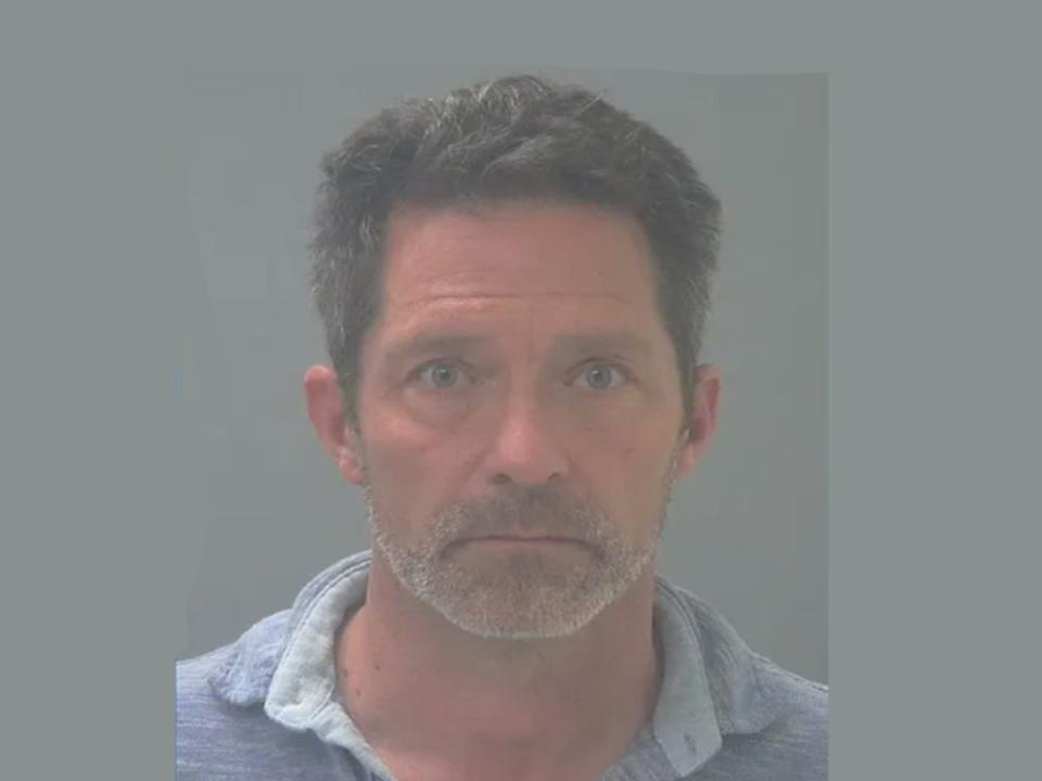 Sean Hollonbeck, 54, of Santa Rosa County, Florida, was arrested and charged with aggravated assault and kidnapping after he held an Uber driver against his will with an AR-15 (Santa Rosa County Sheriff’s Office)