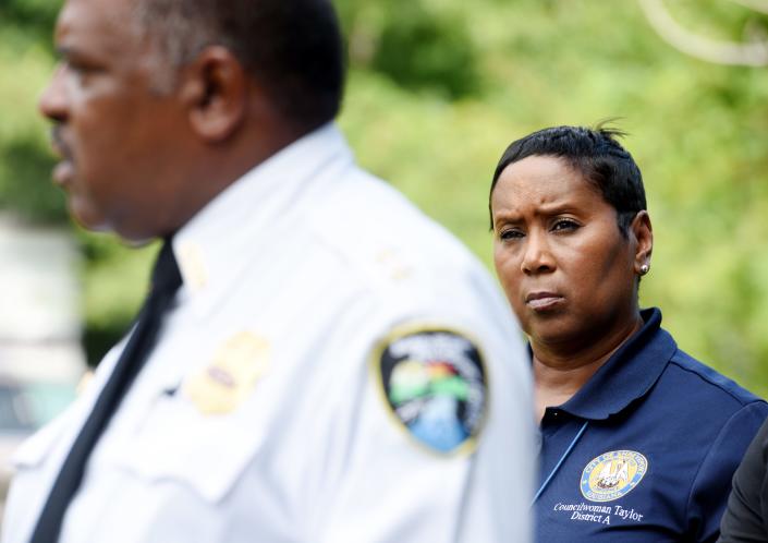 Shreveport Councilwoman Tabatha Taylor looks at Police Chief Wayne Smith during the press conference on Jones Mabry Rd. Wednesday morning, July 5, 2023, which was the scene of a mass shooting at a 4th of July block party that resulted in 4 deaths and 11 injuries.   