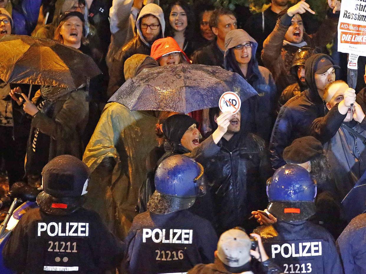 German protesters attend a demonstration against the anti-immigration party AfD: REUTERS