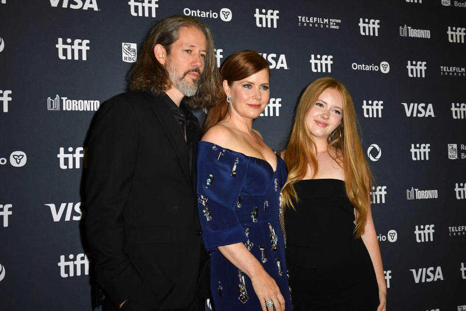 US actress Amy Adams (C), husband actor Darren Le Gallo (L) and daughter Aviana Le Gallo attend the world premiere of 