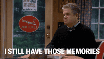 Patton Oswalt sits at a table in a cozy room with a sign reading "The Murder Box" behind him. Caption reads, "I STILL HAVE THOSE MEMORIES."