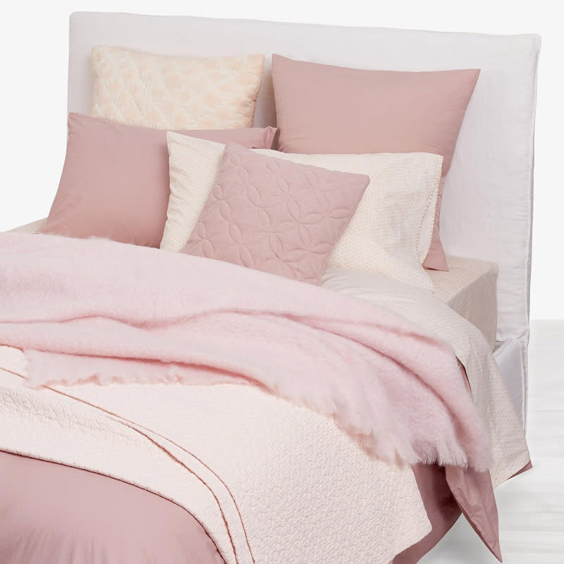 <p>We love the soft blush color and matelasse texture on this coverlet.</p> <p>From $68 (originally from $85) | <a rel="nofollow noopener" href="http://click.linksynergy.com/fs-bin/click?id=93xLBvPhAeE&subid=0&offerid=472601.1&type=10&tmpid=23216&RD_PARM1=http%3A%2F%2Fwww.abchome.com%2Fshop%2Fabcdna-dreamweaver-haath-bedding-rose&u1=Instyle" target="_blank" data-ylk="slk:ABC Carpet & Home;elm:context_link;itc:0;sec:content-canvas" class="link ">ABC Carpet & Home</a></p>