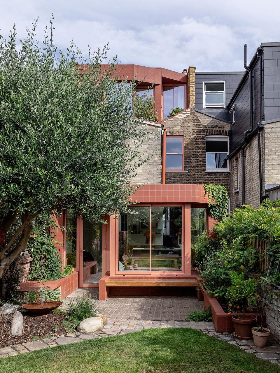 Both extensions at Aden Grove are clad in terracotta tiles (Tara​n Wilkhu)