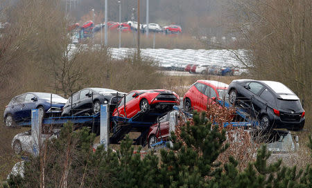 FILE PHOTO: New Toyota cars are transported from their manufacturing facility in Burnaston, Britain March 16, 2017. REUTERS/Darren Staples/File Photo