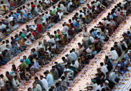 <p>Muslims break their fast with iftar during the holy month of Ramadan on May 29, 2017, in Dubai, United Arab Emirates. (Francois Nel/Getty Images) </p>