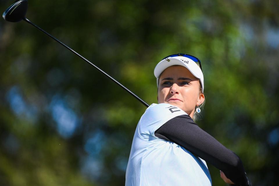 Lexi Thompson tees off from the first hole to start her final round of the Gainbridge LPGA tournament at Boca Rio Golf Club in Boca Raton, Florida, on Sunday, Jan. 30. 2022.