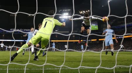 Britain Soccer Football - Manchester City v Tottenham Hotspur - Premier League - Etihad Stadium - 21/1/17 Tottenham's Dele Alli scores their first goal Action Images via Reuters / Jason Cairnduff Livepic