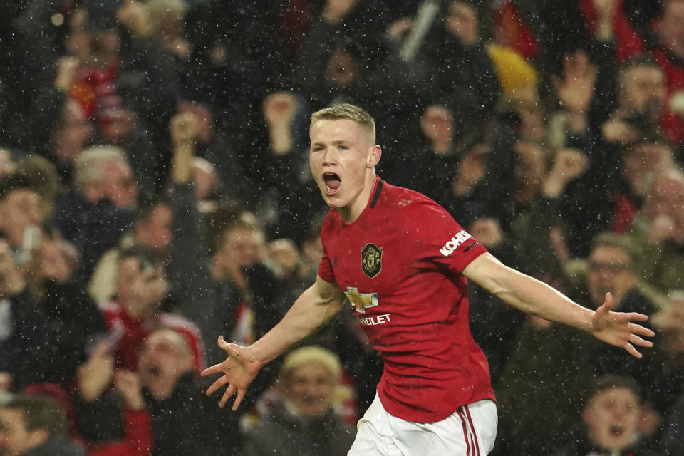 Manchester United's Scott McTominay celebrates after scoring his side's second goal during the English Premier League soccer match between Manchester United and Manchester City at Old Trafford in Manchester, England, Sunday, March 8, 2020. (AP Photo/Dave Thompson)
