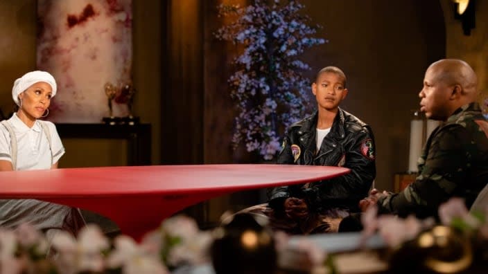 On the latest “Red Table Talk,” Jada Pinkett Smith (left) and daughter Willow (center) sit down with the late Michael K. Williams’ nephew, Dominic Dupont (right), who found the actor dead from a fentanyl overdose. (Photo: Lucy Snow)