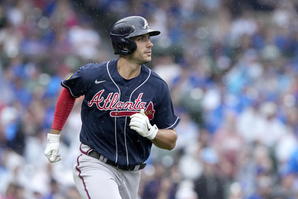 Atlanta Braves' Matt Olson watches his two-run home run off Chicago Cubs relief pitcher Adbert Alzolay during the ninth inning of a baseball game Saturday, Aug. 5, 2023, in Chicago. (AP Photo/Charles Rex Arbogast)