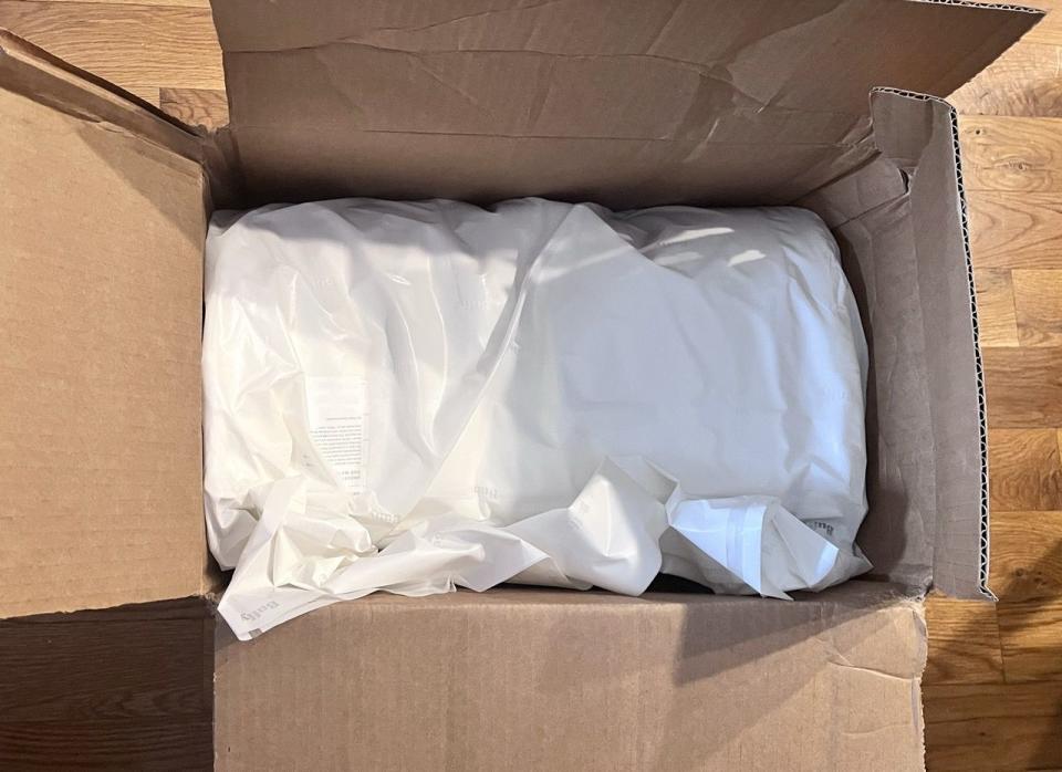 a box with a white sheet