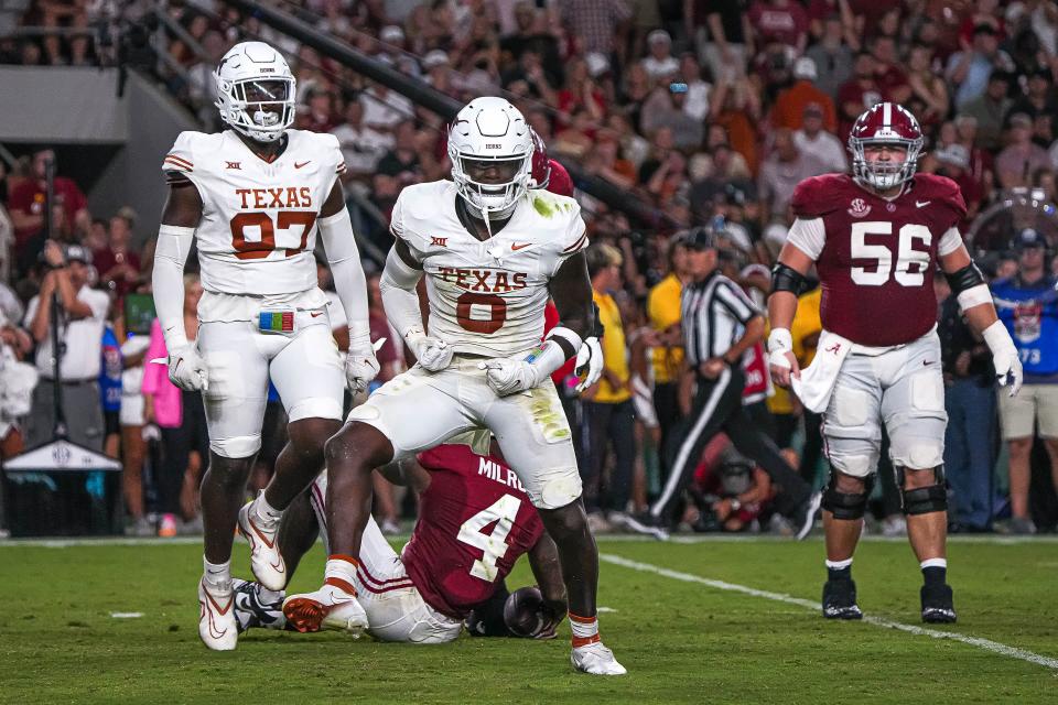 Texas Longhorns linebacker Anthony Hill Jr. (0) celebrates a sack during the game against Alabama at Bryant-Denny Stadium on Saturday, Sept. 9, 2023 in Tuscaloosa, Alabama.