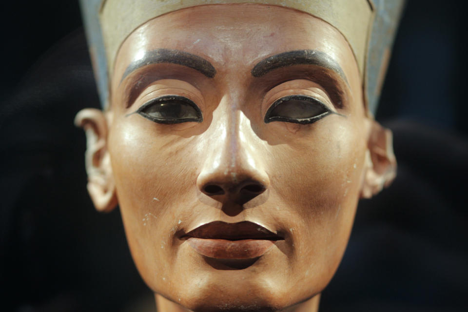 FILE - In this Oct. 15, 2009 file photo the famous 3,300-year-old bust of Queen Nefertiti is on display at the "Neues Museum", ( New Museum), in Berlin, Germany. Berlin is to honor the centenary of the discovery of a famed bust of Egypt’s Queen Nefertiti - one of the city’s top tourist attractions - with an exhibition of works from the Amarna site where she was found, many of them freshly restored. The Egyptian Museum said Monday Aug. 27, 2012 that the show, “In the Light of Amarna,” will open Dec. 6 - the 100th anniversary of the day when a German excavator unearthed the 3,300-year old limestone bust of Nefertiti, wife of Pharaoh Akhenaton, at Amarna in southern Egypt. (AP Photo/Markus Schreiber, file)