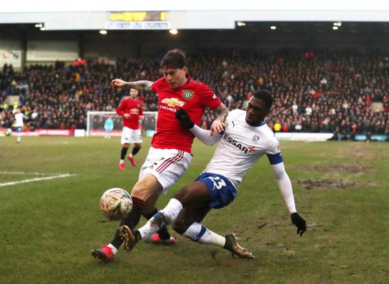 Manchester United's Victor Lindelof challenges for the ball (Reuters)