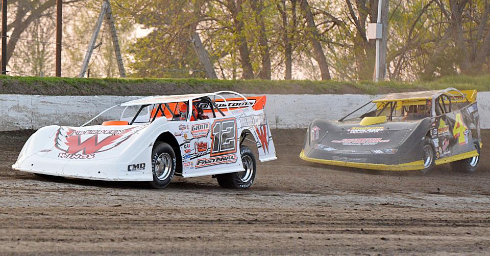 Chad Becker of Aberdeen (12) leads Watertown's Lee Grosz in a late model heat race during the season-opening racing program on Sunday, May 12, 2024 at Casino Speedway in Watertown.