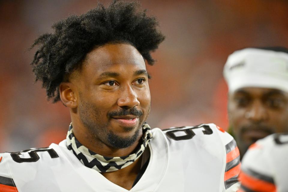 FILE - Cleveland Browns defensive end Myles Garrett stands on the field during an NFL preseason football game against the Chicago Bears, Saturday, Aug. 27, 2022, in Cleveland. Now, more focused, stronger and driven like never before to push himself beyond what he thought possible as he reaches a pivotal point in his NFL career, Garrett has his sights on a new target. He's seeking greatness. Iconic greatness. (AP Photo/David Richard, File)