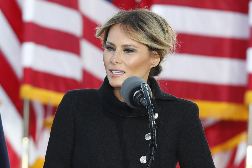 FILE - Then First lady Melania Trump speaks to a small group of supporters as President Donald Trump looks on at Andrews Air Force Base, Md., Jan. 20, 2021. Former first lady Melania Trump will attend the Republican National Convention next week in Milwaukee. That’s according to two people familiar with her plans who spoke on condition of anonymity before full details are released. (AP Photo/Luis M. Alvarez, File)