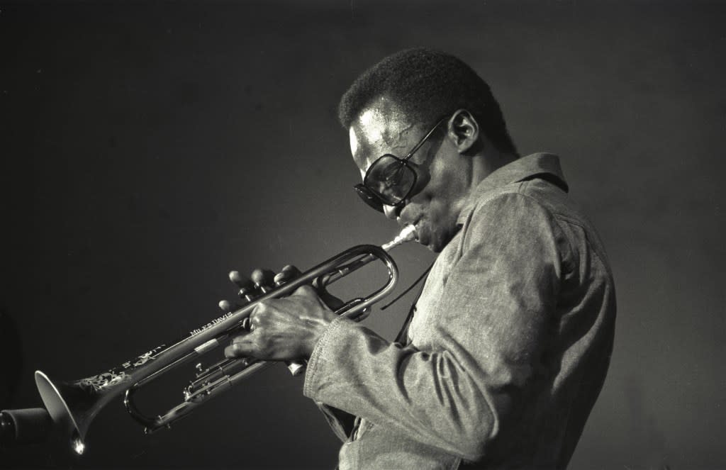 American jazz msuician Miles Davis (1927 – 1991) plays trumpet during the Schaefer Music Festival at Central Park’s Wollman Rink, New York, New York, July 8, 1969. (Photo by Jack Vartoogian/Getty Images)