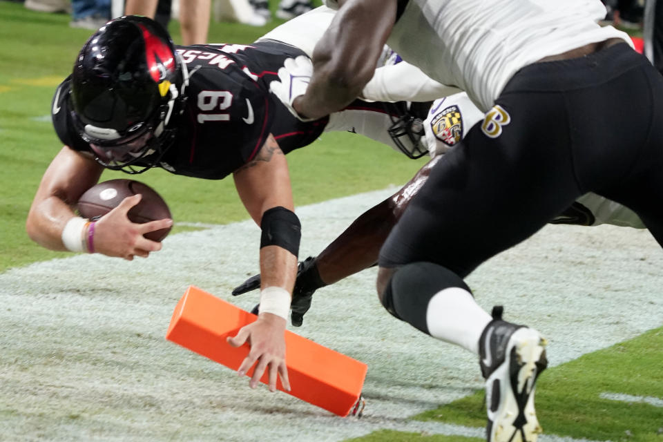 Arizona Cardinals quarterback Trace McSorley (19) is knocked out of bounds short of the goal line against the Baltimore Ravens during the second half of an NFL preseason football game, Sunday, Aug. 21, 2022, in Glendale, Ariz. (AP Photo/Darryl Webb)