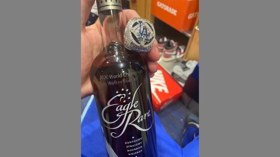 Dodgers pitcher Walker Buehler showed off his World Series ring and a custom bottle of bourbon from Eagle Rare.