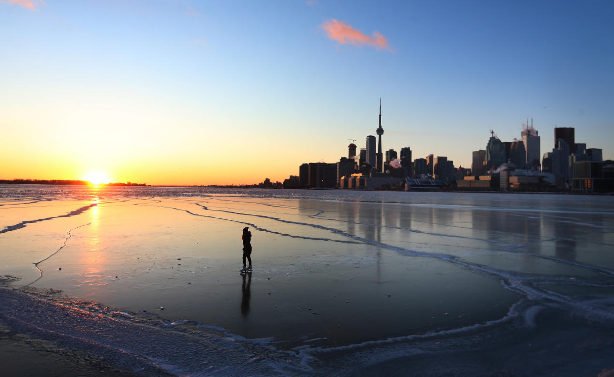 People brave the ice on Toronto Harbour at Polson Pier/Getty Images