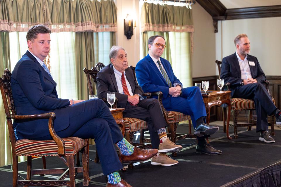 Tulsa Mayor G.T. Bynum, at right, attends a fundraiser for Oklahomans United for Progress with former U.S. Rep. Mickey Edwards, center, and Oklahoma City Mayor David Holt, at left.