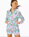 <p><strong>Lilly Pulitzer</strong></p><p>lillypulitzer.com</p><p><strong>$198.00</strong></p><p><a href="https://go.redirectingat.com?id=74968X1596630&url=https%3A%2F%2Fwww.lillypulitzer.com%2Fupf-50-luxletic-islanna-performance-jacket%2F006656.html&sref=https%3A%2F%2Fwww.townandcountrymag.com%2Fstyle%2Ffashion-trends%2Fg43143996%2Flily-pulitzer-break-the-love-collaboration-shop%2F" rel="nofollow noopener" target="_blank" data-ylk="slk:Shop Now;elm:context_link;itc:0" class="link ">Shop Now</a></p>