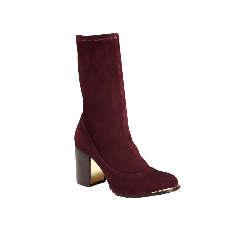 <a rel="nofollow noopener" href="https://shoprachelzoe.com/shop/footwear/tara-stretch-suede-boots/?attribute_pa_color=win%20" target="_blank" data-ylk="slk:Tara Stretch Suede Boots, Rachel Zoe, $368;elm:context_link;itc:0;sec:content-canvas" class="link ">Tara Stretch Suede Boots, Rachel Zoe, $368</a>