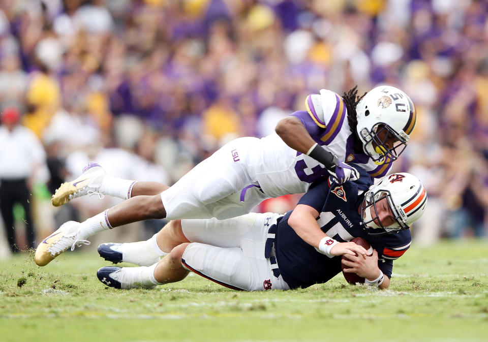 BATON ROUGE, LA - OCTOBER 22: Derrick Bryant #36 of the LSU Tigers sacks quarterback Clint Moseley #15 of the Auburn Tigers during the game at Tiger Stadium on October 22, 2011 in Baton Rouge, Louisiana. (Photo by Jamie Squire/Getty Images)