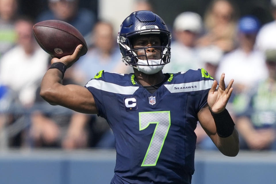 Seattle Seahawks quarterback Geno Smith passes against the Los Angeles Rams during the first half on an NFL football game on Sunday, Sept. 10, 2023, in Seattle. (AP Photo/Stephen Brashear)