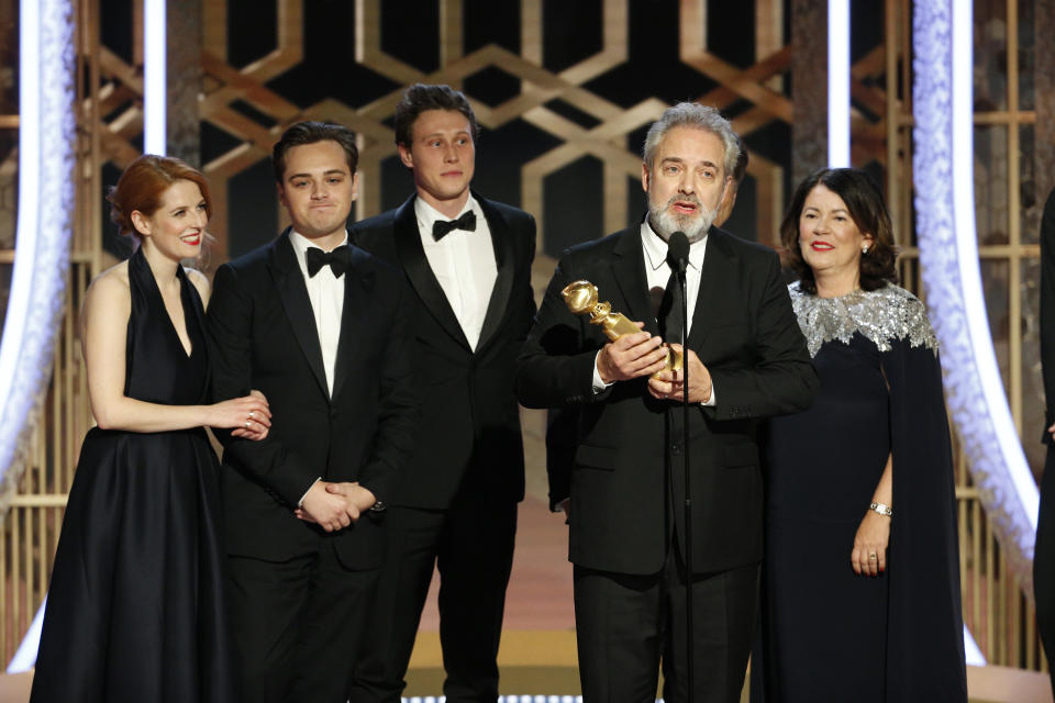 BEVERLY HILLS, CALIFORNIA - JANUARY 05: In this handout photo provided by NBCUniversal Media, LLC,   Sam Mendes accepts the award for BEST MOTION PICTURE - DRAMA for "1917" onstage, with Dean-Charles Chapman, George MacKay and Pippa Harris, during the 77th Annual Golden Globe Awards at The Beverly Hilton Hotel on January 5, 2020 in Beverly Hills, California. (Photo by Paul Drinkwater/NBCUniversal Media, LLC via Getty Images)
