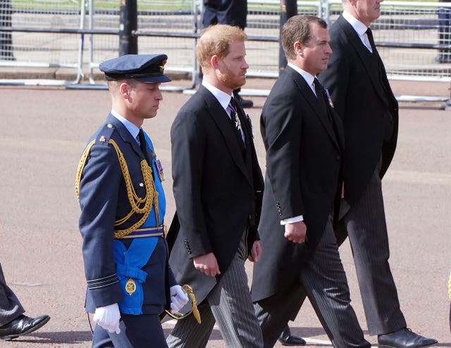 The Prince of Wales and the Duke of Sussex follow the coffin of the Queen (Ian West/PA)