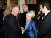 Britain's Prince Charles (L) speaks with actress Barbara Windsor at the Royal World Premiere of "Alice In Wonderland" in London February 25, 2010. REUTERS/Ian West/Pool (BRITAIN - Tags: ENTERTAINMENT ROYALS)