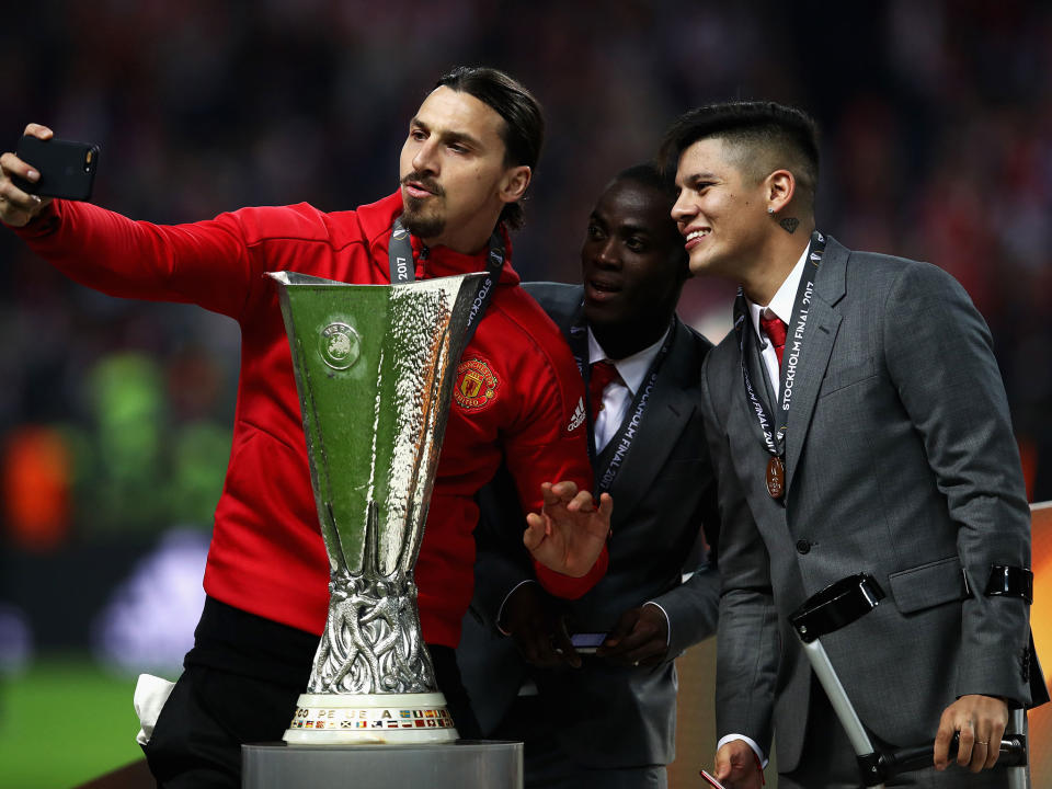 Zlatan Ibrahimovic celebrates with his teammates after United's Europa League victory in Stockholm: Getty