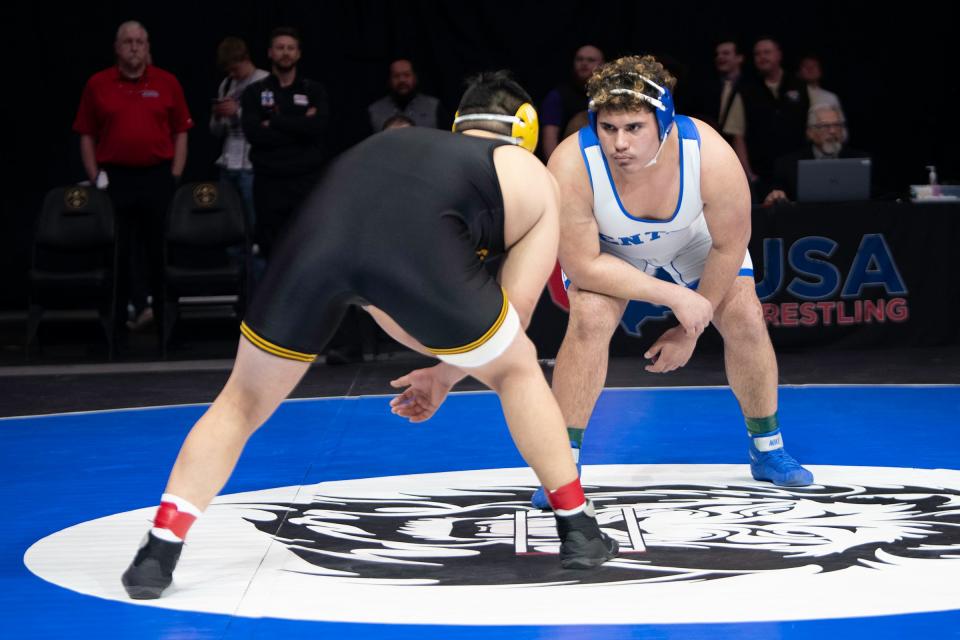 Pueblo Central's Mariano Romero-Garcia stares down Aidan Trujillo of Valley ahead of their 285-pound championship match of the Class 3A state wrestling tournament at Ball Arena on Saturday, Feb. 18, 2023.