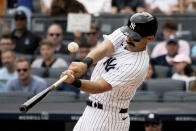 New York Yankees' Matt Carpenter hits during the first inning of a baseball game against the Boston Red Sox, Sunday, July 17, 2022, in New York. (AP Photo/Julia Nikhinson)