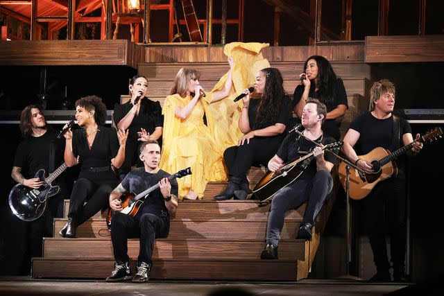 <p>Michael Campanella/TAS24/Getty</p> Taylor Swift with her band and vocalists in Stockholm, Sweden on May 17, 2024