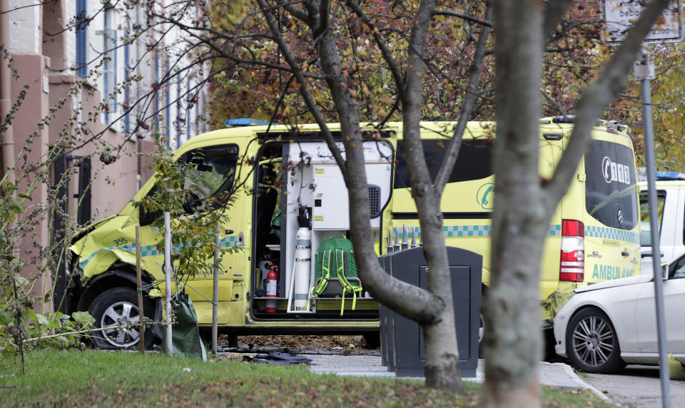 A damaged ambulance is seen parked after an incident in the center of Oslo, Tuesday, Oct. 22, 2019. Norwegian police opened fire on an armed man who stole an ambulance in Oslo and reportedly ran down several people. (Stian Lysberg Solum/NTB scanpix via AP)