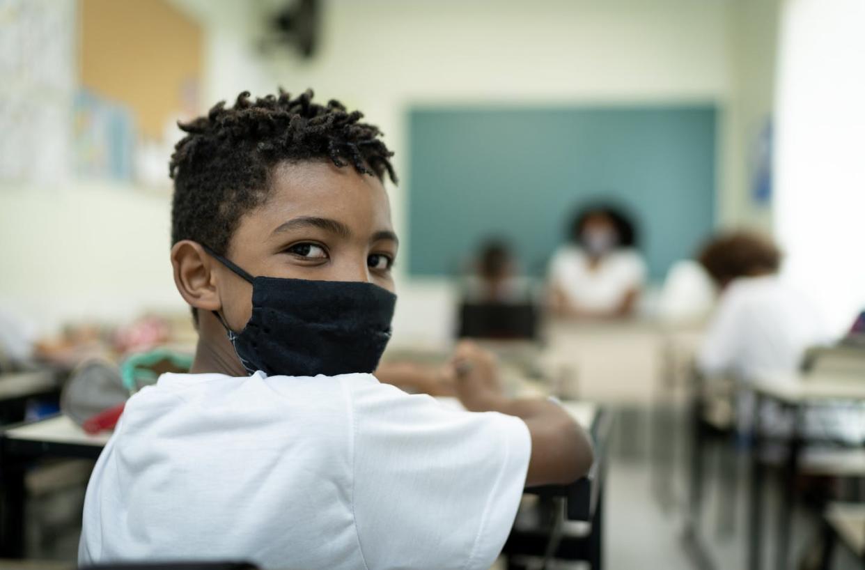 <span class="caption">Adolescents could soon be eligible, but vaccine trials are just getting started for younger children.</span> <span class="attribution"><a class="link " href="https://www.gettyimages.com/detail/photo/portrait-wearing-face-mask-of-a-schoolboy-studying-royalty-free-image/1279862521" rel="nofollow noopener" target="_blank" data-ylk="slk:FGTrade via Getty Images;elm:context_link;itc:0;sec:content-canvas">FGTrade via Getty Images</a></span>