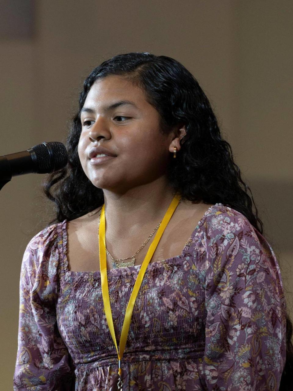 Yazlenny Avila, from Thinking Child Christian Academy, spells a word during the third round Miami Herald Miami-Dade/Monroe County Spelling Bee.