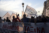 Protesters take part in an anti-government rally at the northern city of Thessaloniki, Saturday, Sept. 7, 2019. Greek Prime Minister Kyriakos Mitsotakis will give a speech on the Thessaloniki International Fair's grounds outlining his economic policies for the next year, as heads of government have traditionally done over the years. The banner reads : "We do not bargain. We claim on the basis of working class." (AP Photo/Giannis Papanikos)