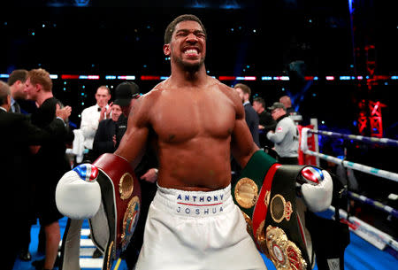 Boxing - Anthony Joshua v Alexander Povetkin - WBA Super, IBF, WBO & IBO World Heavyweight Titles - Wembley Stadium, London, Britain - September 22, 2018 Anthony Joshua celebrates his win against Alexander Povetkin Action Images via Reuters/Andrew Couldridge