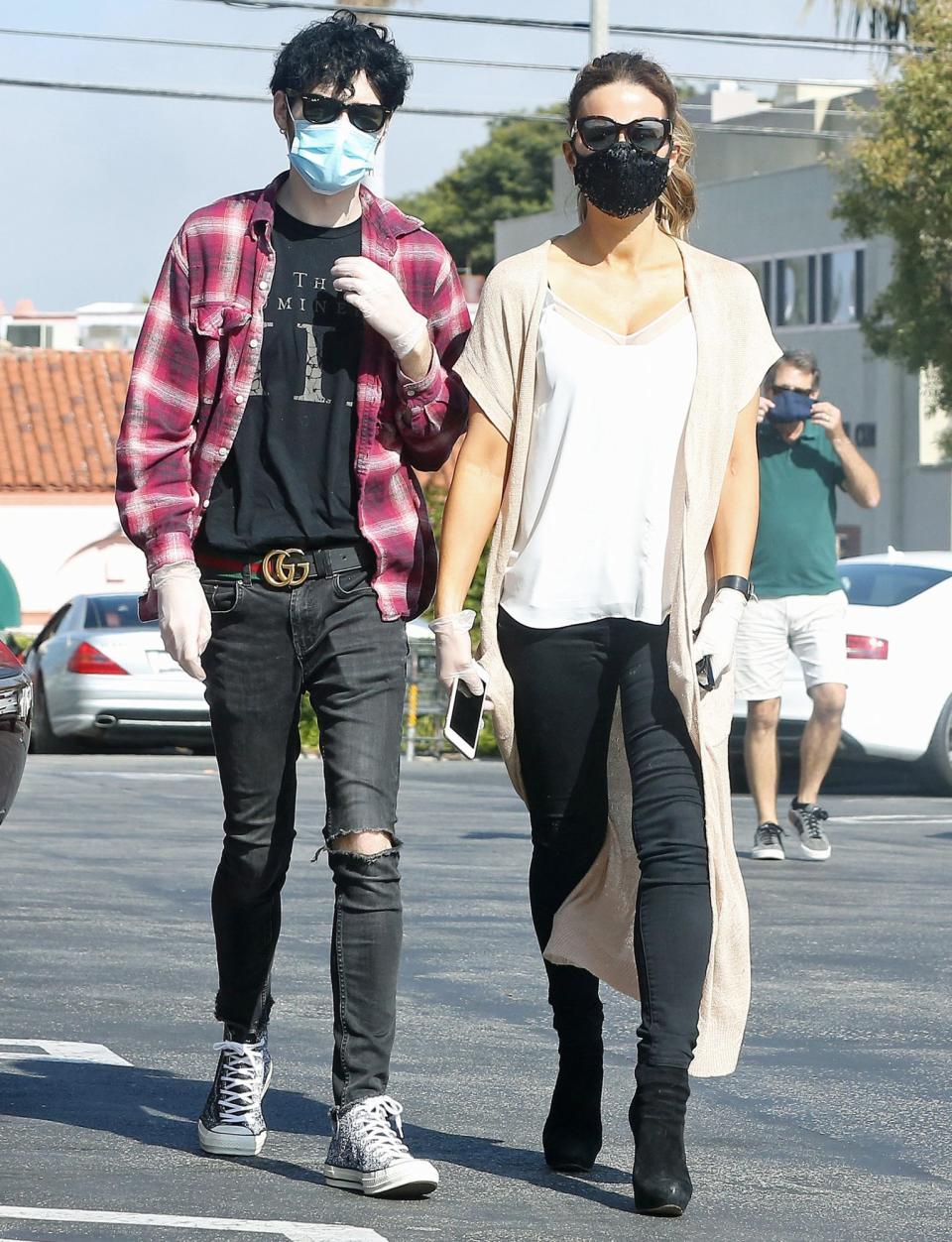 <p>Kate Beckinsale and boyfriend Goody Grace mask up while out and about in L.A. on Wednesday. </p>