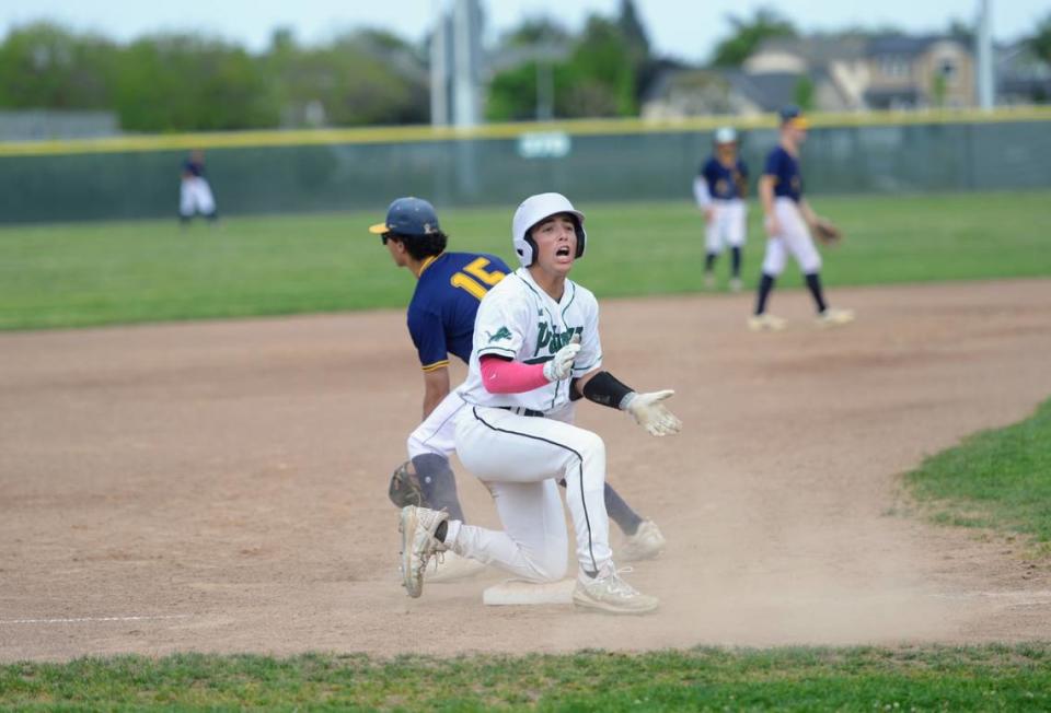 Pitman’s Aiden Sanchez celebrates a triple during a CCAL matchup with Gregori at Pitman High School in Turlock, Calif. on Wednesday, April 24, 2024.