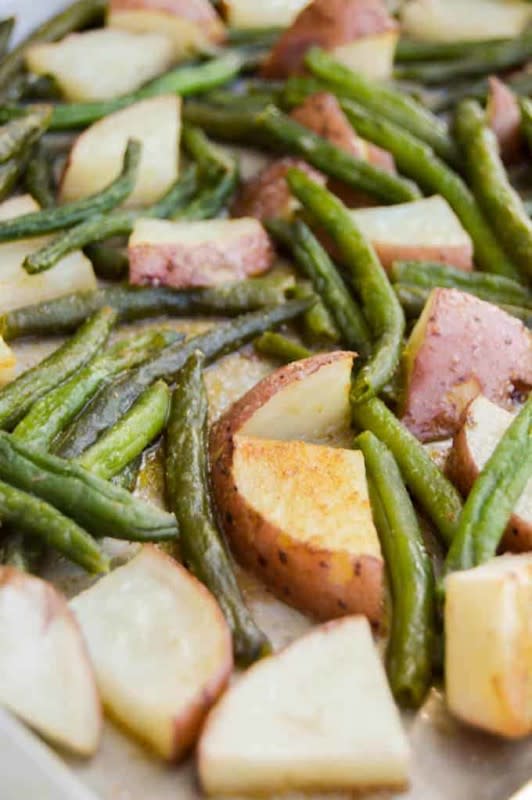 <p>The Diary of a Real Housewife</p><p>This roasted green beans and potatoes recipe is a side dish that is simple to make and one that your family is going to love.</p><p><strong>Get the recipe: </strong><strong><a href="https://www.thediaryofarealhousewife.com/roasted-green-beans-and-potatoes/" rel="nofollow noopener" target="_blank" data-ylk="slk:Roasted Green Beans and Red Potatoes;elm:context_link;itc:0;sec:content-canvas" class="link rapid-noclick-resp">Roasted Green Beans and Red Potatoes</a></strong></p>