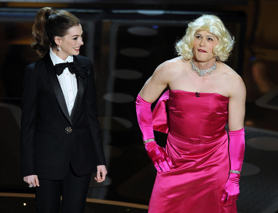 Anne Hathaway and James Franco, in drag, appear on stage during the 83rd annual Academy Awards at the Kodak Theater in Hollywood on February 27, 2011. (AFP PHOTO/Gabriel BOUYS via Getty Images)