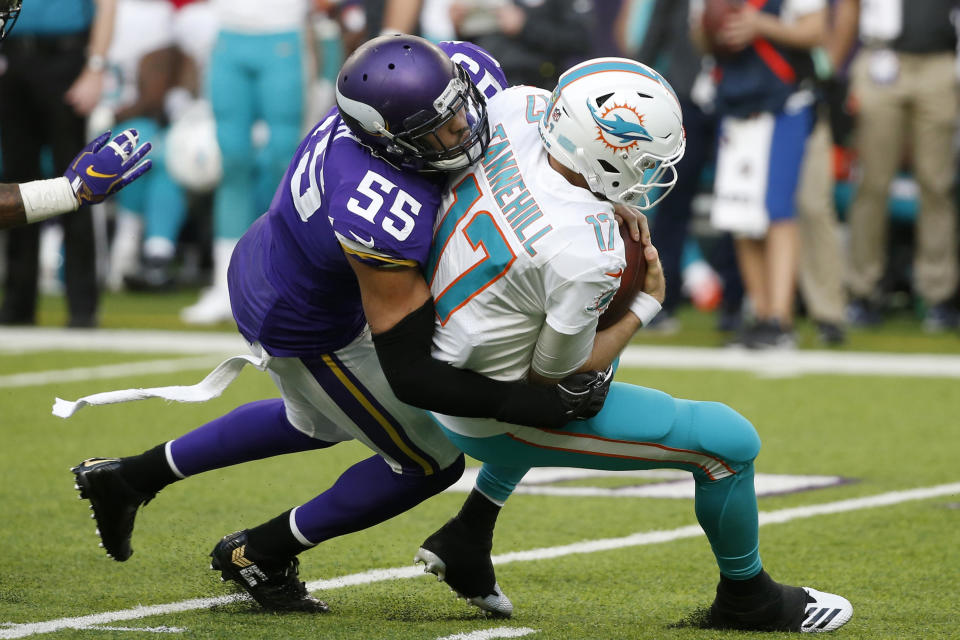 Miami Dolphins quarterback Ryan Tannehill is sacked by Minnesota Vikings outside linebacker Anthony Barr (55) during the second half of an NFL football game, Sunday, Dec. 16, 2018, in Minneapolis. (AP Photo/Bruce Kluckhohn)