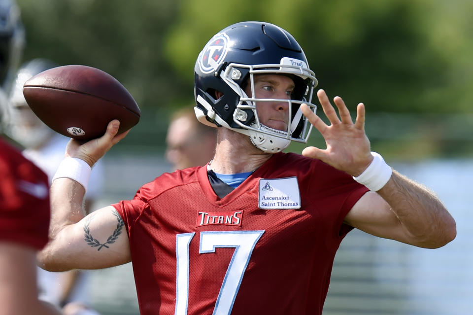 FILE - Tennessee Titans quarterback Ryan Tannehill (17) throws a pass during NFL football training camp in Nashville, tenn., in this Wednesday, July 28, 2021, file photo. The league can’t mandate the vaccine but it made its stance clear through strict protocols for players who don’t get it. “I wouldn’t have got the vaccine without the protocols they are enforcing on us,” Tannehill said this week. (AP Photo/Mark Zaleski, File)